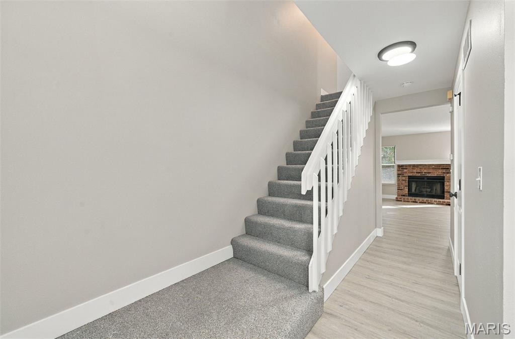 Photo of 2433 Sandalwood Creek Court, Wildwood, MO 63038 (MLS # 26064619)