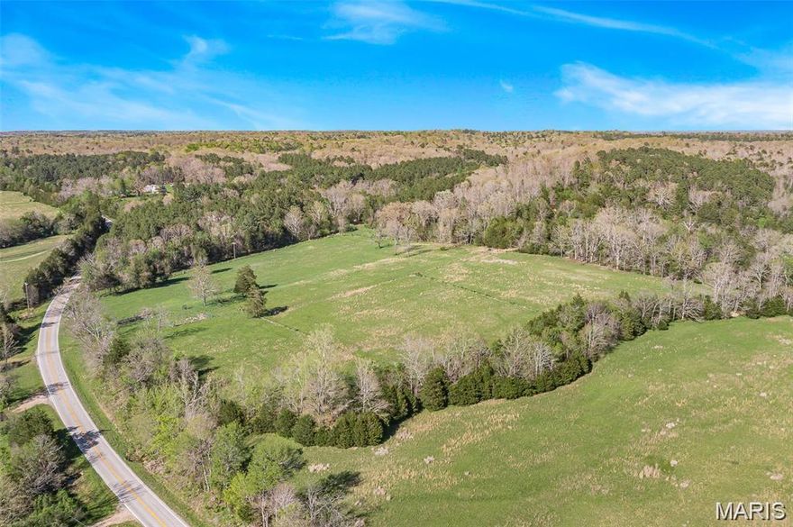 Are you looking for the perfect place to build, develop a hobby farm, raise cattle or horses, or develop a hunting retreat?  We've got you covered!  This 169.83 acres has been recently surveyed and is completely fenced, including some cross fencing in the open fields.  The open fields provide a good stand of grass hay annually, and make excellent pasture for cattle, horses or sheep.  With endless outdoor recreational possibilities, and supreme hunting, the property could easily become the perfect retreat for the outdoorsman in your family.  There are amazing build sites, and two access gates right off of lettered Highway M that make the land very accessible.  So many possibilities!!