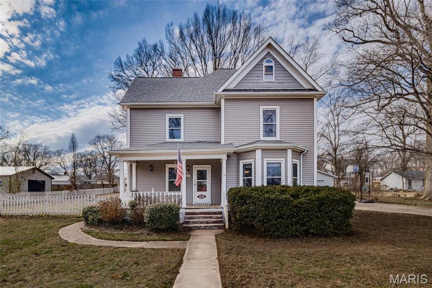 Welcome to 1900, when craftsmanship was not optional and homes were built to make a statement.

This stunning three story Victorian is filled with original character, architectural detail, and the kind of charm that makes you question every new build you have ever walked through. If you are craving personality, history, and rooms with actual intention, this one delivers.

Step inside and you are greeted by rich hardwood floors, soaring ceilings, and beautifully preserved original woodwork. The statement fireplace creates a striking focal point in the main living area, offering all the historic presence you would expect from a true Victorian. The curved staircase immediately catches your eye and reminds you that homes used to be designed with drama in mind.

On the main floor, original pocket doors allow you to open the space for entertaining or close off rooms for a more intimate feel. It is the perfect blend of openness and privacy without sacrificing character. Tall windows flood the rooms with natural light, while solid doors, detailed trim, and thoughtful millwork continue throughout.

The layout feels intentional and substantial, with defined spaces that flow beautifully from one room to the next. No awkward angles. No wasted square footage. Just classic design that has stood the test of time.

Upstairs, you will find two additional levels offering incredible flexibility. Spacious bedrooms, office space, guest quarters, creative studios, or a private upper level retreat. The third floor in particular feels tucked away and full of possibility, giving you that storybook Victorian vibe that simply cannot be recreated.

Outside, the large backyard provides room to spread out and enjoy your own space. Mature trees, open green area, and plenty of room for entertaining, gardening, or relaxing evenings outdoors. A detached garage adds convenience while preserving the character of the property.

This is not a trend house trying to impress you with builder upgrades. It is a true 1900 Victorian with history, presence, and personality. If you have been waiting for a home that actually feels special the moment you step inside, this one deserves your attention.