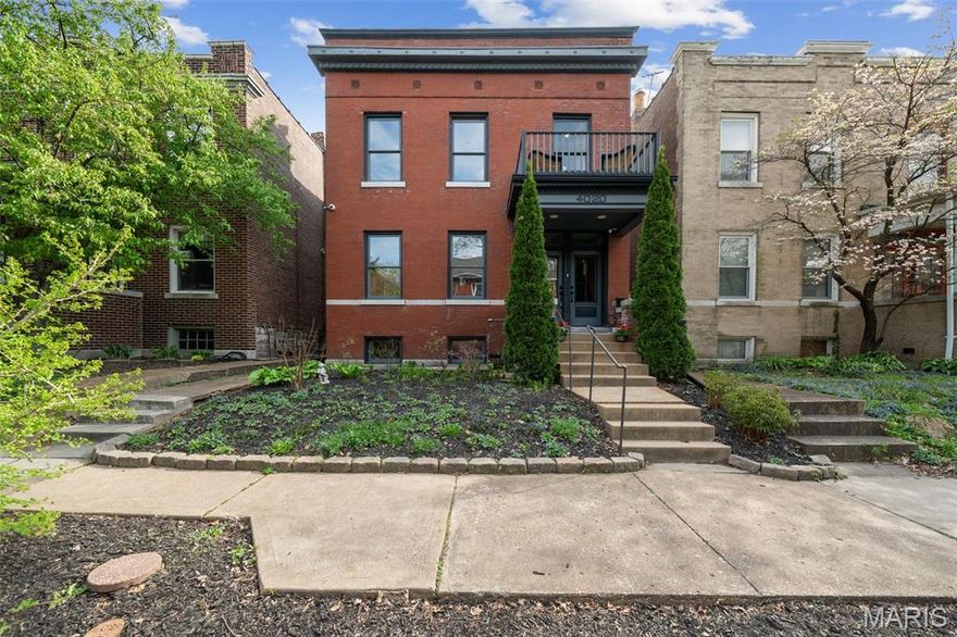 Showings start Friday April 17th. This historic Shaw beauty has been thoughtfully reimagined into a breathtaking forever home, offering over 2,800 square feet of refined living space with 5 bedrooms, 2.5 baths, and the convenience of second-floor laundry. Step inside to timeless elegance in the front of the home, where formal living and dining rooms create the perfect setting for gatherings and special occasions, and boast gorgeous decorative fireplaces. Toward the rear, the home opens into a light-filled family room and a show-stopping kitchen designed to impress — featuring quartz countertops, statement island with breakfast bar, hammered copper farm sink, custom range hood, and sleek stainless-steel appliances. An additional main-level room provides the ideal space for a private office or flex room. Upstairs, retreat to the must-see primary suite — a true sanctuary — complete with double vanities, a custom tile shower, separate soaking tub, spacious walk-in closet, and a private deck for morning coffee or evening unwinding. Two additional generously sized bedrooms, a full bath, a laundry room, and a flexible fifth bedroom or bonus/playroom/boudoir closet complete the second level. Outside, enjoy a large fenced backyard perfect for entertaining, with a deck conveniently located just off the kitchen. Major updates provide peace of mind, including a new roof (2025 and garage roof 2026), replacement wood tilt-in historic windows, all-new electrical and plumbing systems, and dual HVAC systems. The lower level has been proactively prepared with drain tile and a sump pit/pump, and set up for kitsch bar and couple’s cave. A two-car carport with auto door and a commissioned Shaw art "tattoo'd" brick wall commemorating the community. Lovely outdoor entertaining space boasts a taste of the perennial paradise of the nearby gardens and parks.  All of this just a short stroll to the Missouri Botanical Garden, Tower Grove Park, and located within the City Garden Montessori School zone.  Historic charm. Modern luxury. An unbeatable Shaw location. Welcome home!