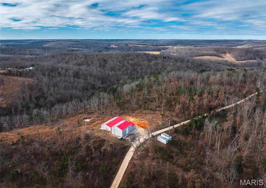 New Year, New Possibilities!

Check out this stunning 66+/- acre private escape!
Accessed by a long, winding driveway, the property offers complete seclusion and a true sense of escape, yet remains conveniently located just 15 miles from Rolla and only a few miles from Edgar Springs.
The property features two brand-new shops, each offering over 1,500+ square feet. Both are partially finished and equipped with mini-split systems, electric and lighting, a new well, large roll-up doors, and more. 
Currently operating as a private mushroom farm, the possibilities are endless—continue the operation, repurpose the buildings for another business venture, or create your own private retreat or residence.
The owner states the tractor with implements and two storage containers convey. This one-of-a-kind property is priced to sell!
Call today to schedule your private showing and experience the peace and potential this land has to offer.