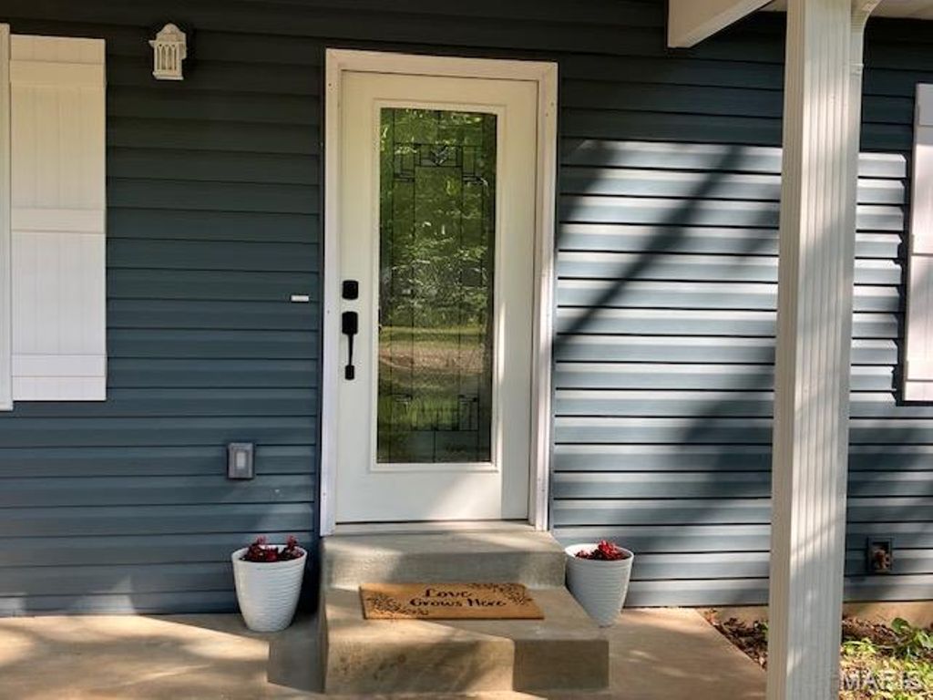 Photo of 12768 Maness Road, De Soto, MO 63020 (MLS # 26027149)