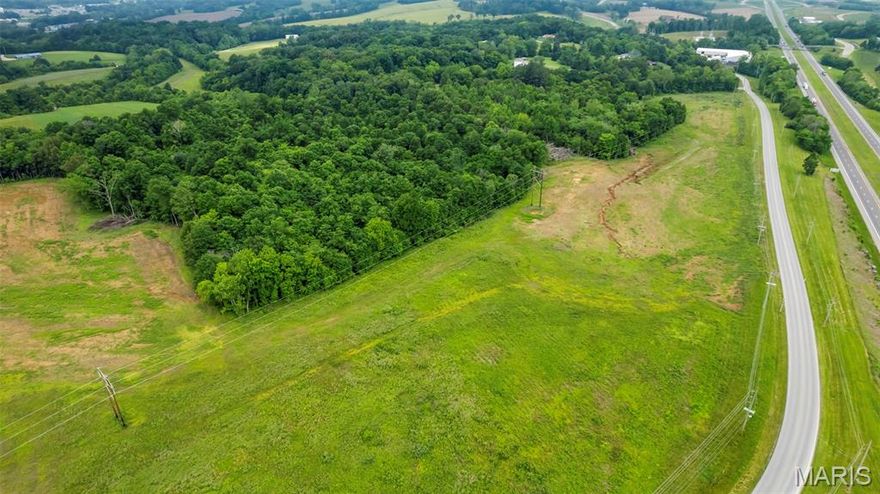 Prime location for your next Commercial Development. This 25.44 acre lot is partially cleared and ready for whatever your imagination desires. Most utilities are onsite or very nearby. It is located within 1.5 miles from I-55 Exit 102 and 1 mile from Exit 99. This is a high traffic retail area with various hotels and retail businesses nearby. Location: High Traffic, Industrial Area, Retail Center