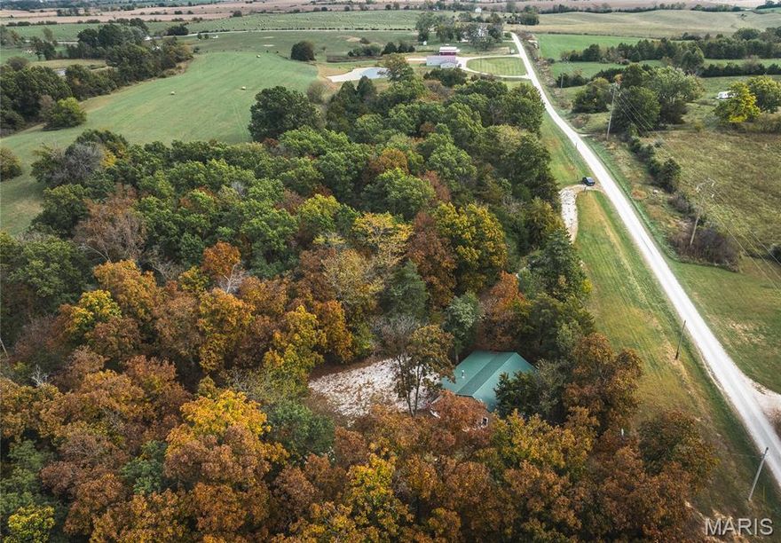 Discover your own private retreat on 59 acres of rolling Missouri countryside, perfectly balanced with open pasture and mature woods. This charming 2-bedroom, 1-bath, 1,200 sq. ft. home offers rustic character and cozy comfort, making it an ideal full-time residence, weekend getaway, or hunting camp. The land is a haven for wildlife—deer and turkey roam freely, and a peaceful pond provides a great water source and serene backdrop. With plenty of room to expand, build, or simply relax, the property offers endless possibilities. Located near Big Creek Conservation Area, you’ll enjoy easy access to thousands of acres of public land for hunting, hiking, and outdoor recreation. Whether you’re dreaming of a small farm, hunting property, or secluded homestead, this piece of the Northern Missouri is ready to make your vision a reality.