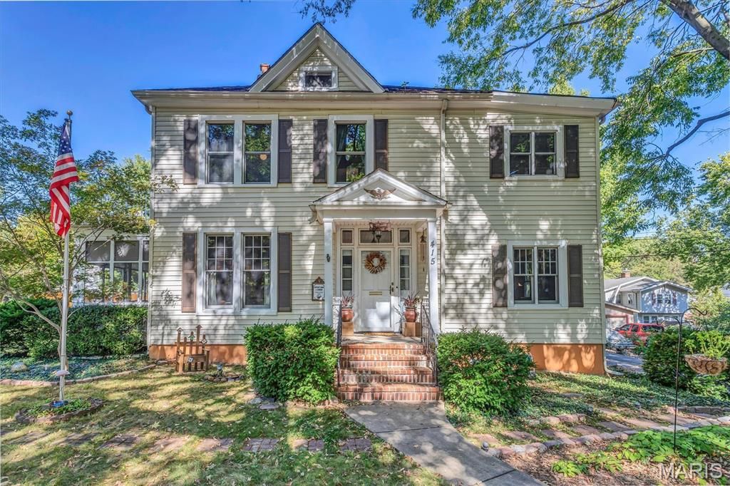 Photo of 415 Wesley Avenue, Ferguson, MO 63135 (MLS # 26011773)