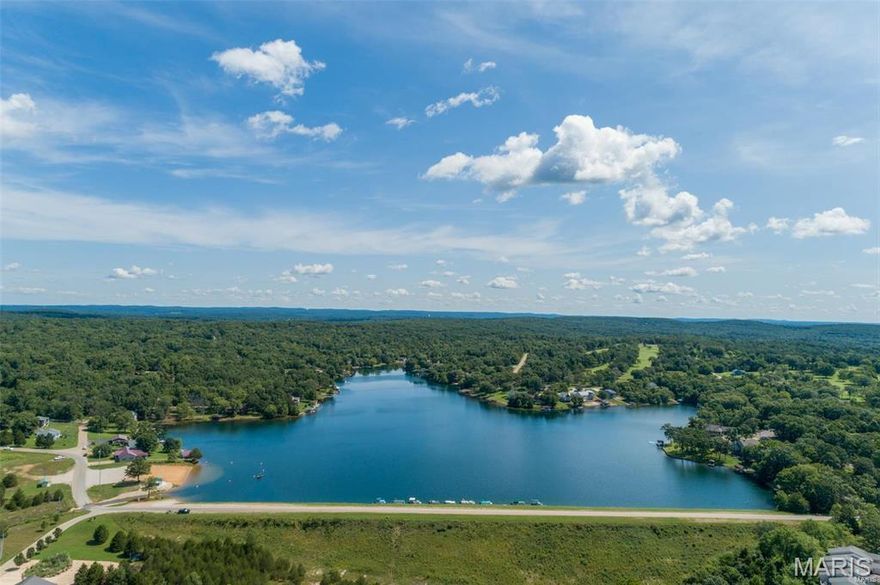 Two lots on paved road in the Lake Community of Terre Du Lac.  16 Lakes, golf course, parks, beaches and more.
