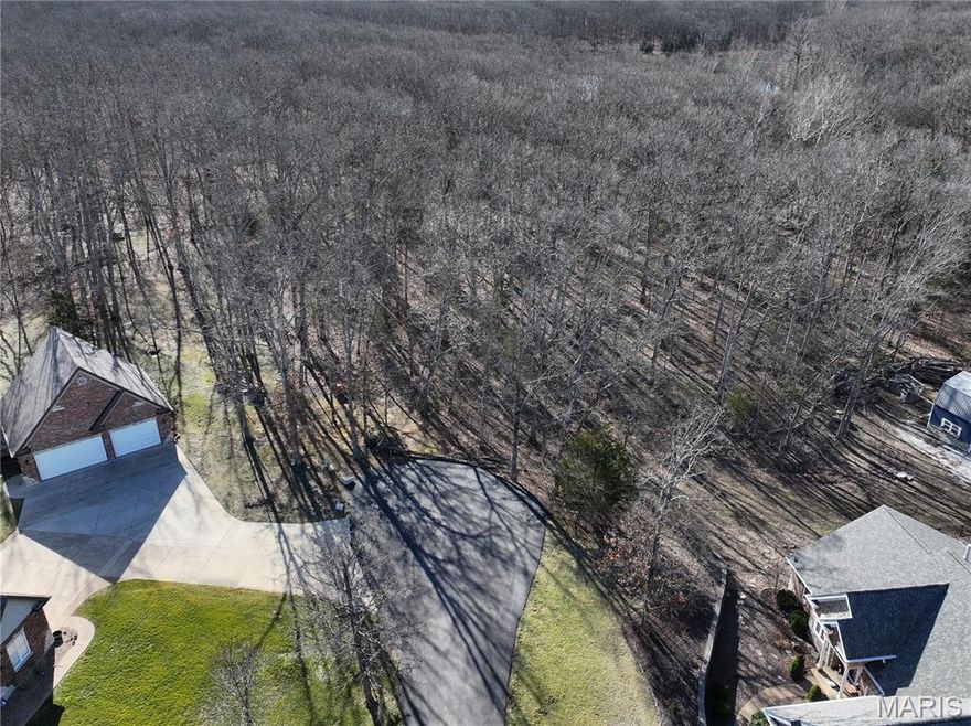 Beautifully wooded 3-acre lot offering privacy and seclusion on a quiet street, just 4 miles from all the shopping, dining, and conveniences of Wentzville.  Located within the highly sought-after Wentzville School District (Timberland High School).  Electric and water present at the site, making this the perfect setting to build your dream custom home.  Enjoy the peaceful, country-like atmosphere while still being close to everything you need!