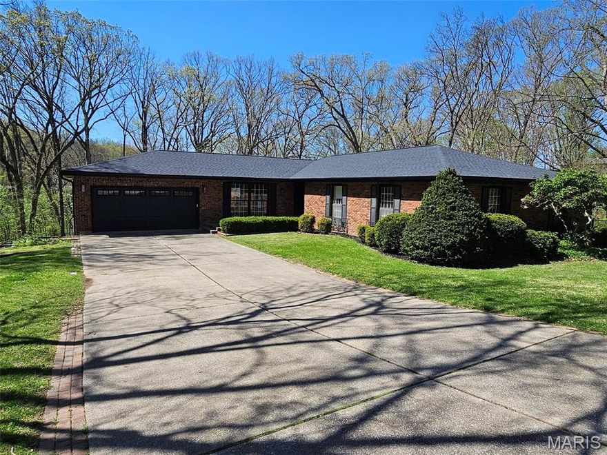 You won't want to miss this stunning home! This beautifully updated 4-bedroom, 3 full bath property truly has it all. The stylish mid-century modern kitchen is a standout feature, complemented by a built-in bar that seamlessly connects the kitchen and living space, perfect for entertaining. Enjoy cozy evenings with two fireplaces, including a charming wood-burning option.The partially finished basement offers additional living space along with an expansive workshop area, ideal for hobbies or storage. Step outside to a spacious double deck overlooking a peaceful wooded backdrop, where you can relax with your morning coffee and take in the surrounding wildlife.
Tucked away at the end of a quiet cul-de-sac, this home offers both privacy and a serene setting while still providing all the modern updates you're looking for.