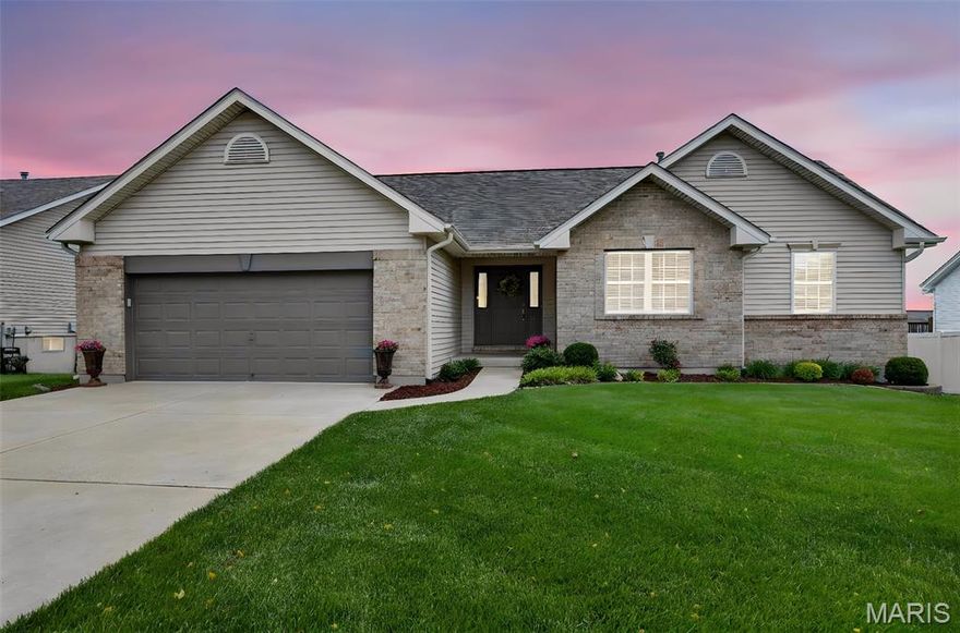 Beautifully maintained ranch home offering an open and inviting floor plan with soaring vaulted ceilings, abundant natural light, and warm hardwood throughout living area. The spacious living room features a cozy fireplace and flows seamlessly into the kitchen/dining area, creating the perfect space for entertaining and every day living.The kitchen offers ample cabinet space, large center island and generous counter space with stainless steel appliances.
Retreat to the oversized primary suite complete with vaulted ceilings and a spa like en-suite with a large soaking tub, separate shower, and dual vanity. Additional living space can be found throughout the home with spacious second bedroom with well appointed finishes and a sitting room that can easily be transformed into a 3rd bedroom.  The basement provides ample storage space and perfect to add your own finishing touches. 
Step outside to expansive patio and perfectly groomed large level backyard perfect for grilling and hosting gatherings! Hurry this one is going to go fast!