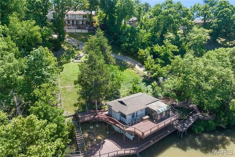 Photo of 180 Borders Drive, Lake Ozark, MO 65049 (MLS # 26029078)