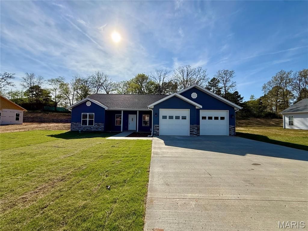 Photo of 317 Kearbey Drive, Poplar Bluff, MO 63901 (MLS # 26021225)