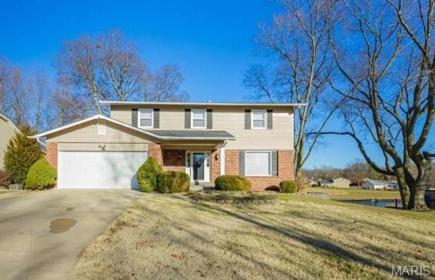 SPACIOUS AND UPDATED TWO STORY ON WOODED LOT W/COVERED FRONT PORCH AND NEWER DECK OVERLOOKING A STOCKED FISHING LAKE.WHITE SIX PANEL DOORS, WOOD TRIM & CROWN MOULDING AND FINISHED W/O BASEMENT W/STAINED 6 PANEL DOORS, WAINSCOATING & TRIM, BERBER CARPET & FRENCH DOORS WALKOUT TO PATIO. NICE VIEW FROM NEARLY EVERY ROOM IN THE HOUSE! CERAMIC LOOK LAMINATE FLOORING IN FOYER, ML BATH, BREAKFAST ROOM & KITCHEN. LOTS OF PRETTY WOODEN CABINETS IN THE FULLY EQUIPPED KITCHEN. BAY WINDOW/SEAT IN DINING ROOM, MAIN LEVEL FAMILY ROOM FEATURES A WOOD BURNING FIREPLACE WITH BLOWERS AND BUILT IN BOOKSHELVES. LARGE MASTER SUITE HAS DOUBLE WALK IN CLOSETS WITH ADJOINING BATH WITH DOUBLE BOWL VANITY. NEWER APPLIANCES, WATER HEATER, FURNACE & AIR CONDITIONER AND WINDOWS. YOU MUST SEE THIS ONE! OWNER/AGENT. NO SMOKING, NO PETS. MINIMUM CREDIT SCORE 675-700. PLEASE NOTE: Yard not fenced & backs to common ground & lake.