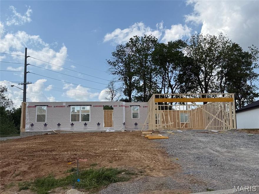 Under Construction - Corner lot in McKendree Crossing Neighborhood - fantastic location close to Cape/Jackson/Schools/I-55. Nothing beats the smell of BRAND NEW! Vaulted ceilings, with living room, kitchen and dining opening to each other giving extra space and room + that also opens to a partially covered deck. The split bedroom concept gives privacy, primary bath features walk-in shower and double vanity with large walk-in closet. Stylish kitchen with center island, solid surface countertops and stainless steel appliances. No carpeting on the main floor with luxury vinyl flooring all through-out. The full walk-out basement offers a pre-designed layout  for later expansion. Expected completion appx 90 days. Buyer still has time to pick out some finishes