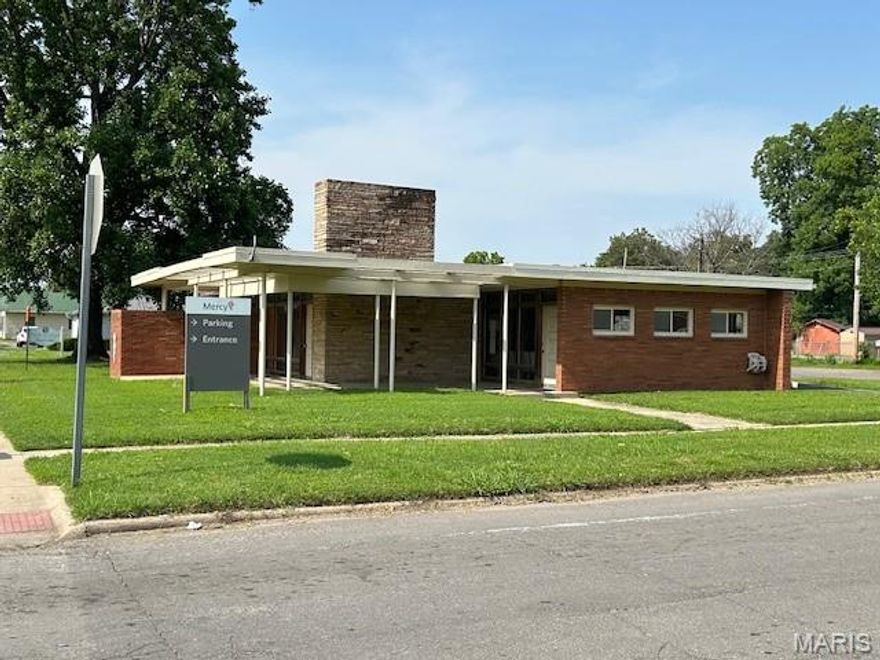 This 2,950 SF brick building presents a compelling case for the discerning investor seeking office or office building assets. Boasting a typical medical floor plan with multiple entrances, this well-maintained property features a brand-new roof and generous off-street parking on a spacious corner lot. Currently leased to a national healthcare corporation, it offers a secure and reliable income stream. For detailed financial information, a signed NDA is all that's needed to unlock this potential gem's full scope.