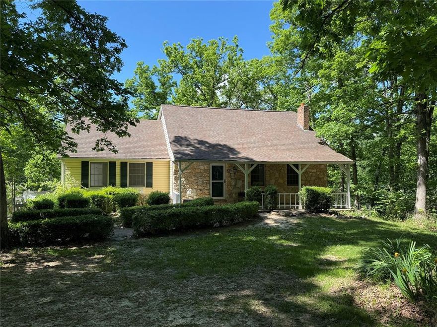 Highlights of this property are 3.5 acres, access to a private lake, three bedrooms, and three and a half bathrooms. The main level has a large living room, dining room, and kitchen. The dining room has patio doors to the deck that overlooks the private lake. The main level has one bedroom with a private bathroom. There is also a laundry room and half bathroom on the main level. The upstairs has two bedrooms and one full bathroom. There are also two sleeping nooks. The basement has a family room, sleeping room, and an additional bathroom. There is a two car attached garage and additional parking in the driveway. This land has no covenants and restrictions. The lake is shared with the surrounding houses. Enjoy the outdoors from the front porch, the backyard, or the fire pit.