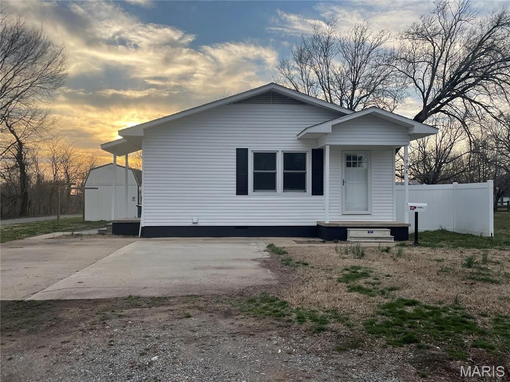 Photo of 908 Millar Street, East Prairie, MO 63845 (MLS # 26013162)