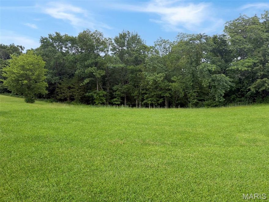 Discover the perfect setting for your custom dream home on this beautiful 1-acre lot nestled within an upscale community. Surrounded by natural beauty and backing to mature trees, this homesite is ideally positioned at the end of a quiet cul-de-sac for added privacy and tranquility. Community features include public water and sewer, underground utilities, concrete streets with curbs and gutters, high-speed internet, and protective covenants. Residents also enjoy access to a scenic 4+ acre stocked lake. Conveniently located near the country club, shopping, restaurants, and the Washington riverfront, this is one of the final opportunities to build in a premier luxury neighborhood.