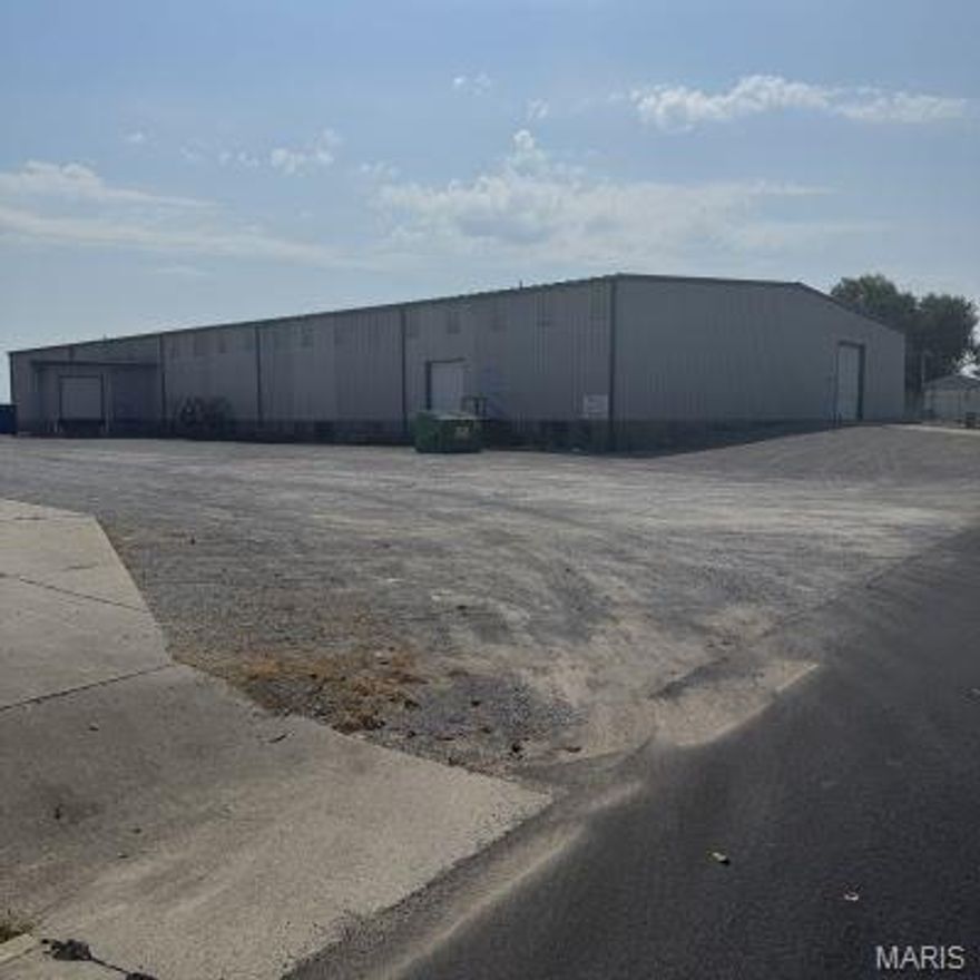 Large warehouse space with easy access to I-55 and I-57.  The space is easily separated into two units if desired.  The front space is 20,000 square feet with columns in the middle and 25' bays.  18' ceiling height and concrete floor.  2 bathrooms.  2 loading docks plus 1 overhead door.  The back unit is almost 5,000 square feet and contains a shop area with 3 offices, 3 bathrooms and a lockable storage area.  2 12x14 overhead doors.