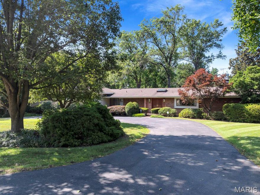Active again after repairs! Nestled in a quiet, private neighborhood within walking distance of a well known country club, and just moments away from the intersection of highways 64/40 and 270, this unassuming home offers handsomely sized rooms within a generous footprint and myriad options for entertaining, relaxing, work and play. The features are numerous: an ensuite with his and hers baths and a walk-in/walk-through closet, floor-to-ceiling views of the parklike back yard, 2 fireplaces, 2 bar areas, skylights, an immense great room, a heated pool, rear and side covered porches, as well as lots of storage, bonus and office areas. Move in as-is or refresh/remodel/reconfigure to make it completely suit your heart's desire as well as your everyday practical living needs. The gates to New Ballas Road are closed, so please enter via Conway Road along the golf course. But don't just drive by, make an appointment and see for yourself. this could be just what you've been waiting for!