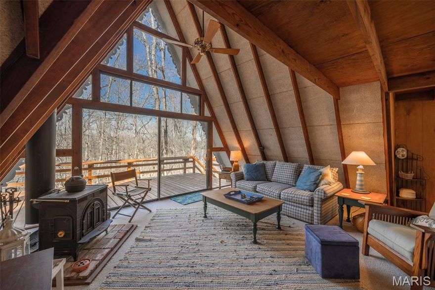 Some chalets at Innsbrook feel like someone just discovered the place. This one feels like Innsbrook itself — rooted, genuine, and exactly where it belongs.
Situated on the original side of the community near the quiet shores of Lake Wanderfern, this 1-bedroom, 1-bath L-frame chalet carries the kind of character that only comes with time. The classic L-frame footprint sets it apart from the more common A-frame silhouettes throughout the resort — a distinctive design that opens up the floorplan and creates a natural sense of space both inside and out. The interior is well-preserved and true to its era: original finishes in solid condition that speak to a property that has been genuinely cared for, not flipped or over-renovated. What you see is real, and it's in good shape. Step outside and the lot immediately earns its own spotlight. Open, spacious, and uncommonly generous for this pocket of the community, it gives you breathing room that tighter lots simply can't offer — room for a future addition, expanded decking, a firepit circle, or just wide-open green space to enjoy the outdoors the way Innsbrook was meant to be enjoyed. The exterior presents beautifully — well-maintained and move-in ready from the moment you pull up. Most furnishings convey with the property, meaning you can be lake-ready from day one without the headache of outfitting a second home from scratch. Location-wise, this one is hard to beat for buyers who appreciate Innsbrook's roots. The original side of the community carries a sense of history and a laid-back pace that draws buyers back year after year. Lake Wanderfern sits just nearby, offering the peaceful, wooded lake atmosphere that defines the Innsbrook experience — quiet mornings on the water, evening walks through the hardwoods, and all the resort amenities just a short ride away. Whether you're searching for a personal weekend retreat, a vacation rental investment, or your first step into the Innsbrook lifestyle, this chalet checks the boxes that matter: honest bones, a standout lot, a strong location, and the kind of authentic Innsbrook charm that newer builds are still trying to replicate. Properties like this — original, well-kept, spacious lot, move-in ready — don't stay available long on the original side. Come see it before someone else does. Most furnishings included. Buyer to verify all details.