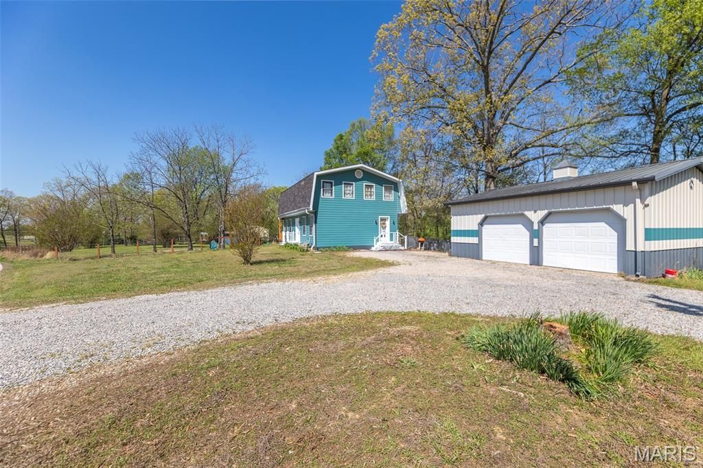 Photo of 763 County Road 476, Poplar Bluff, MO 63901 (MLS # 26021195)