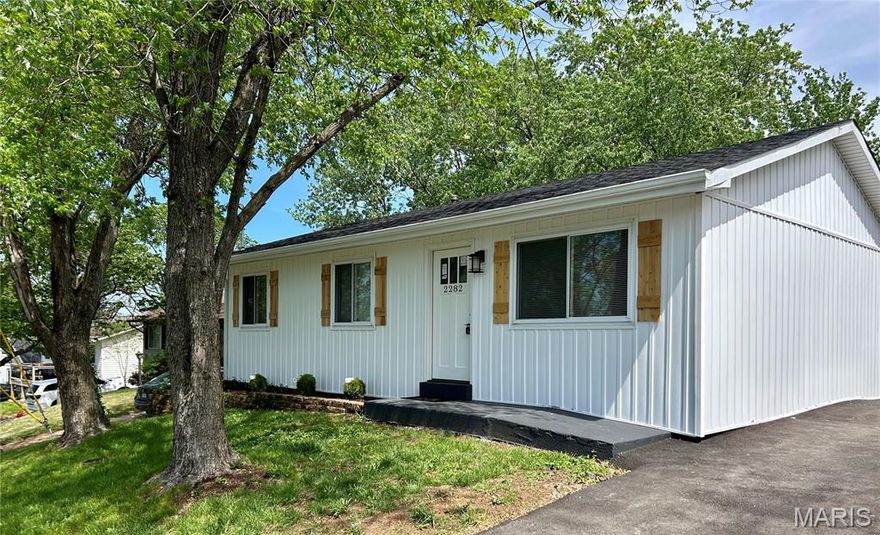 Back on the market! Major upgrade completed: brand new pvc sewer lateral line from the home out to the main, including a new yard vent access. Now ready for you to move right into this tastefully updated, 3-bedroom ranch in the heart of Arnold. This home has been updated from top to bottom. Walk up the freshly paved driveway and into stylish, brand new LVP throughout the home, including the finished basement. Head into the shiny, bright kitchen with all-new cabinets, ceramic tile backsplash, lighting, fixtures, and stainless appliances. Yes, the refrigerator is included! The full bath features a new bathtub with a stylish surround, vanity, lighting, and fixtures. Down the hall, there are 3 bedrooms, including a generously sized primary and a main-floor laundry. Downstairs is a partially finished area perfect for hanging out, watching TV, or an office. Actually, the space is large enough for all 3! Head out back to the covered back porch where you can sit and relax. Additional updates for this home include a brand-new HVAC system, updated vinyl windows and siding, and new electrical service both inside and out.  Schedule you showing today!