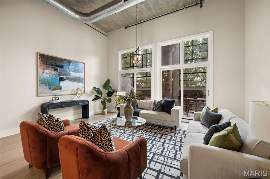 Welcome to 4100 Forest Park Ave #121—where contemporary design meets an unbeatable location and easy city living.

This light-filled loft makes a strong first impression with soaring ceilings, oversized windows, and an open layout that feels both spacious and comfortable. The kitchen is open to the main living space, overlooking the oversized windows and creating a natural flow that works well for everyday living and entertaining. This 1-bedroom, 1.5-bath unit also includes an additional room perfect for a home office or flex space. The entire condo has a fresh coat of paint and all new vinyl plank flooring throughout. The bedroom offers a private retreat with an en suite bath and walk-in closet, while the covered patio extends your living space outdoors. One assigned parking space adds convenience, and the building includes a pool, rec room with billiards, secure entry, elevator access, guest suite, and gated parking with EV charging stations. Located in the heart of Midtown, you’re just steps from IKEA St. Louis, City Foundry STL, and Cortex Innovation Community, with the St. Louis MetroLink a short walk away, and minutes from favorites like Vicia, Scarlett's Wine Bar, and Northwest Coffee Roasting Company. This is a great opportunity to enjoy a connected, modern lifestyle in one of St. Louis’ most active areas.

This condo has passed St. Louis City Occupancy Inspection.