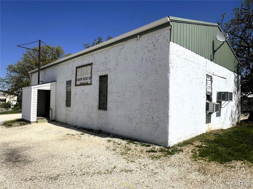 Prime opportunity in the heart of Bowling Green at 931 US Business 61. Situated on approximately 3/4 of an acre, this high-visibility property offers an outstanding location with strong traffic exposure and endless potential for the right investor or developer. The current building needs someone to bring it back to life, making this an ideal candidate for renovation, redevelopment, or a fresh start.

Positioned in a desirable commercial corridor with B-1 Highway Business District Zoning that allows exciting possibilities, including potential upper-level residential/apartment use (subject to city approval), this property is well suited for mixed-use development, retail, office space, or income-producing investment.
Rare chance to secure a generously sized lot with flexible future use potential in a great community. Bring your vision and transform this site into something special!