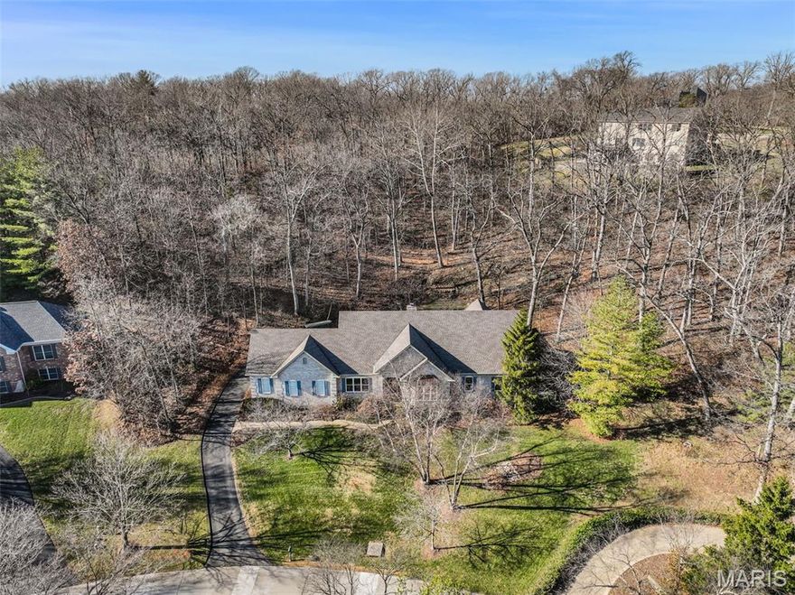 This spectacular sprawling ranch home in sought after area of Sunset Hills is a show stopper! Right across from the golf course and 2940 sq. ft. just on main level with a fully finished beautiful lower level. Peace and quiet, one level living and easy location to everywhere here. Quality everywhere from built ins, coffered ceilings, huge master bedroom with all updated master bath . This home sits up overlooking peace and trees, backs to a nice patio with lots of privacy! Plantings and landscaping are showcased in the pictures from spring and summer mornings and evenings of enjoyment, truly professionally landscaping.   Move in ready and quickly dont wait. MANY RECENT UPDATES INCLUDING ROOF, HARDIE BOARD SIDING, FASCIA, TUCKPOINTING ON CHIMNEY, NEW HVAC SYSTEMS. Front porch has retractable screen. Walk into office or den w built ins , formal ding room off kitchen, then the great room overlooking fireplace, patio and extreme tranquil yard right here in beautiful coveted Sunset Hills. 3 car garage is 30 x 26, extra storage galore, with workbenches.   Crown molding and Trey ceilings in great room, dining room and master.  extra big and deep! Golf to your hearts desire and its right across the street, which also provides the nice quiet, private atmosphere.