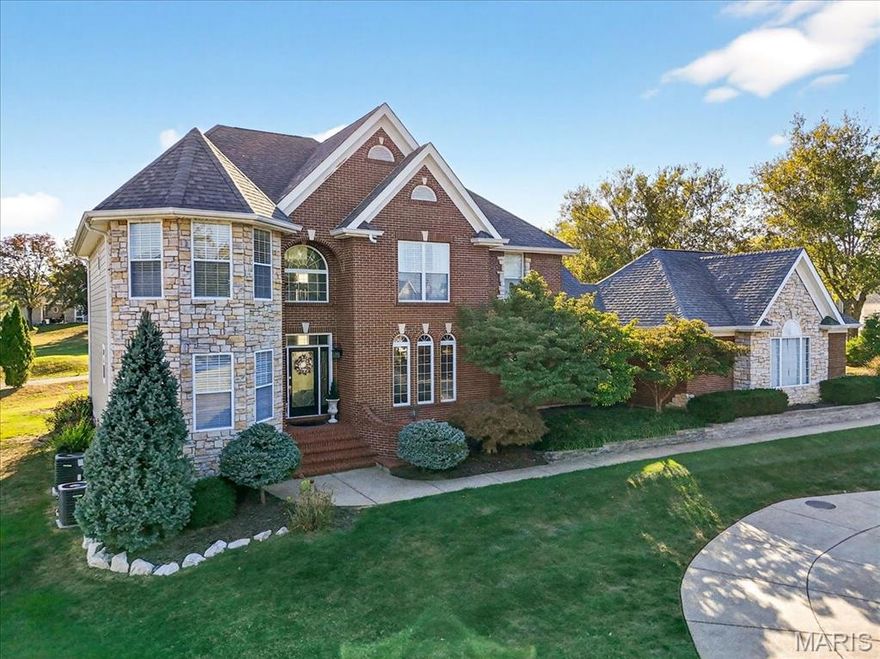 Experience refined living in this stunning 5-bedroom, 4.5-bath 1.5 story home perfectly situated in the prestigious Whitmoor Country Club. Every inch of this home has been thoughtfully updated, blending elegance, functionality, and luxury in a breathtaking golf course setting. Step inside to an impressive two-story foyer and great room featuring 18-foot ceilings, expansive floor to ceiling windows, see through fireplace and abundant natural light that highlights the home’s open, airy feel. The gourmet kitchen is the centerpiece of the main level, complete with high end appliances including two Fulgor ovens, custom cabinetry, a spacious center island, and quartz countertops—ideal for both everyday meals and entertaining. Enjoy two luxurious master suites, one on each floor, both offering private retreats with spa-inspired luxury baths and serene golf course views. One of the home’s most distinctive features is the round turret-style home office, showcasing built-in, floor-to-ceiling bookshelves and elegant woodwork. The finished lower level is designed for entertaining, featuring a wet bar, large recreation area, media space, and ample room for gatherings. Step outside to a true backyard oasis—a sparkling inground pool, expansive patio, and lush landscaping overlooking the North Course 9th hole women's tee box. Whether hosting summer barbecues or enjoying a quiet evening by the pool, this outdoor space delivers relaxation and style. Additional highlights include a three-car rear entry garage, full brick and stone front elevation, designer lighting, plantation shutters, updated flooring, and meticulous attention to detail in every room. This home offers the perfect balance of modern updates, architectural character, and resort-style amenities—all within a sought-after golf course community. If you’ve been dreaming of a home that offers both grandeur and warmth, this property delivers unmatched quality, comfort, and views that make every day feel like a getaway.