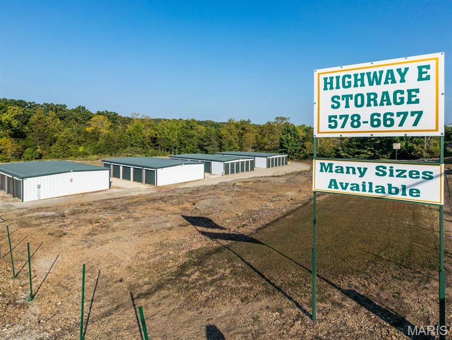 INVESTORS!  INVESTORS  !INVESTORS! Many possibilities with this piece of property. There are 4 Steel frame storage buildings , 30 x 50. One unit houses security camera equipment. Two units have been donated for a few years but recipients understand they will pay with new owners. Occupancy rate is currently 90%. The remaining 4 acres could be used to add  more storage units, build duplexes, 4 plexes or RV storage. Possibilities abound!!
















o