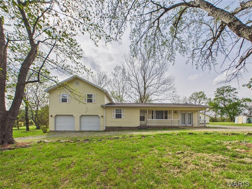 Escape to the quiet of the countryside in this spacious 3-bedroom, 2-bath 1.5-story home. Perfectly situated on a nearly 2-acre lot in the Neelyville School District, this property offers the privacy you crave with the convenience of paved road frontage and quick access to Poplar Bluff. Inside, you'll find over 1,700 sq. ft. of living space, including a massive 16x17 primary suite and a versatile main level room, perfect for a large home office, 4th bedroom, or game room. The exterior features a beautiful mix of open field and mature timber ideal for enjoying local wildlife from your own backyard. The back of the home has a spacious deck with multiple levels and entry points in to the house, making it one of the centerpieces of the property. The detached shop is ideal for storage, hobbies, or can be finished out to be a mancave or she shed. Move-in ready with a modern heat pump and central air. Professional survey on file. Schedule your showing today!