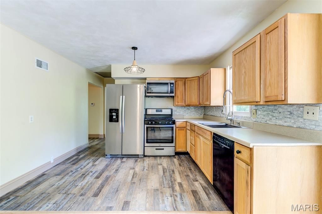 Photo of 50 Oakwood Lane, St Louis, MO 63129 (MLS # 26025963)