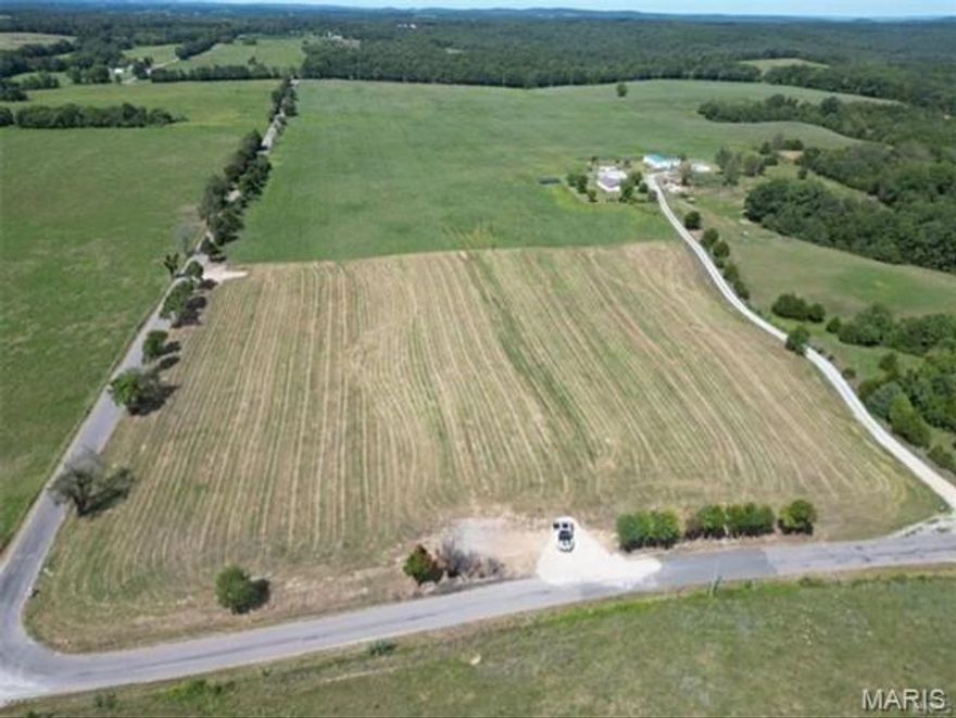 WHAT an amazing homesite! Almost 7 acres of gently rolling pasture surrounded by beautiful farms ready to build on! Blacktop road frontage, only minutes from Farmington, Electric onsite, make for a one of a kind homesite or minifarm! NO RESTRICTIONS!