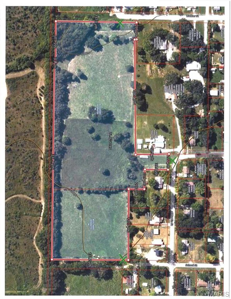 11.80 acres of undeveloped land inside the city limits of Licking, MO! Great location for New Build; Spec/Custom homes, duplexes and/or apartments.  Property is made up of 2 parcels of land totaling 11.80 acres with 3 access points: Walker Ave, Rogers Ave and Gated entrance off of School St. Gated entrance(East side of parcel) has a city water meter and water spigot. City water and sewer lines ran to the end of Walker Ave (West side of parcel), making utilities readily available to enter the West section of the property. With this land having so much potential and possibility, this is not a property to pass up!