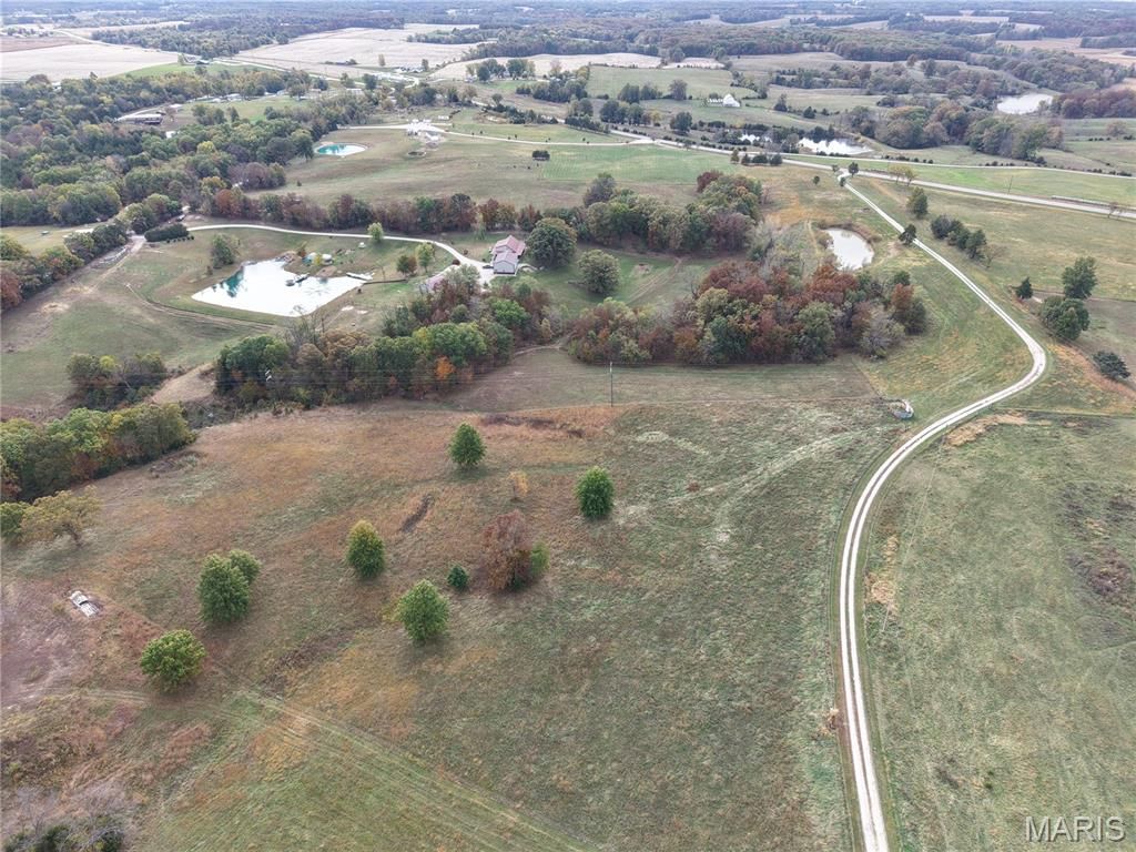 Photo of 30 State Highway 6, Lewistown, MO 63452 (MLS # 25072778)