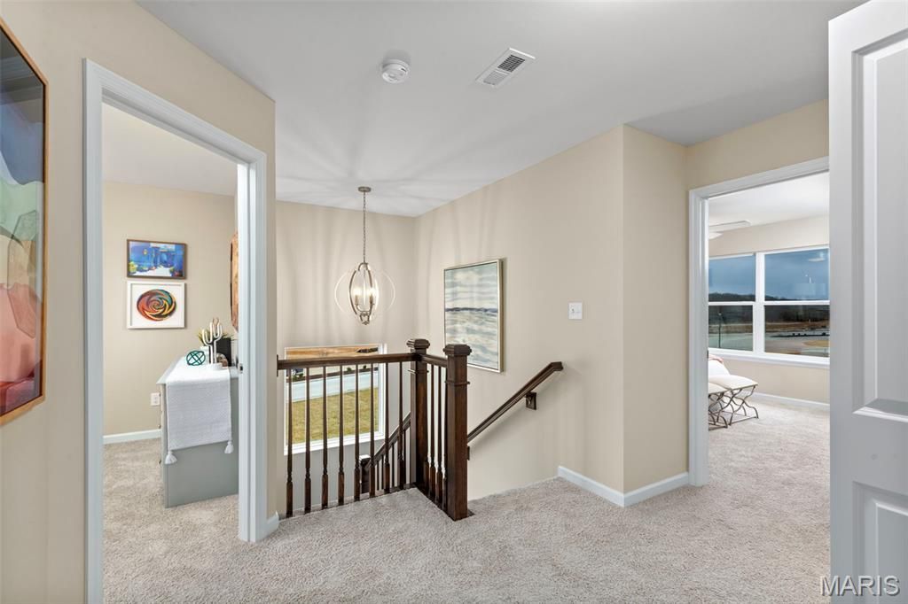Photo of 2 Sterling at Whispering Pines LN, High Ridge, MO 63049 (MLS # 26029558)