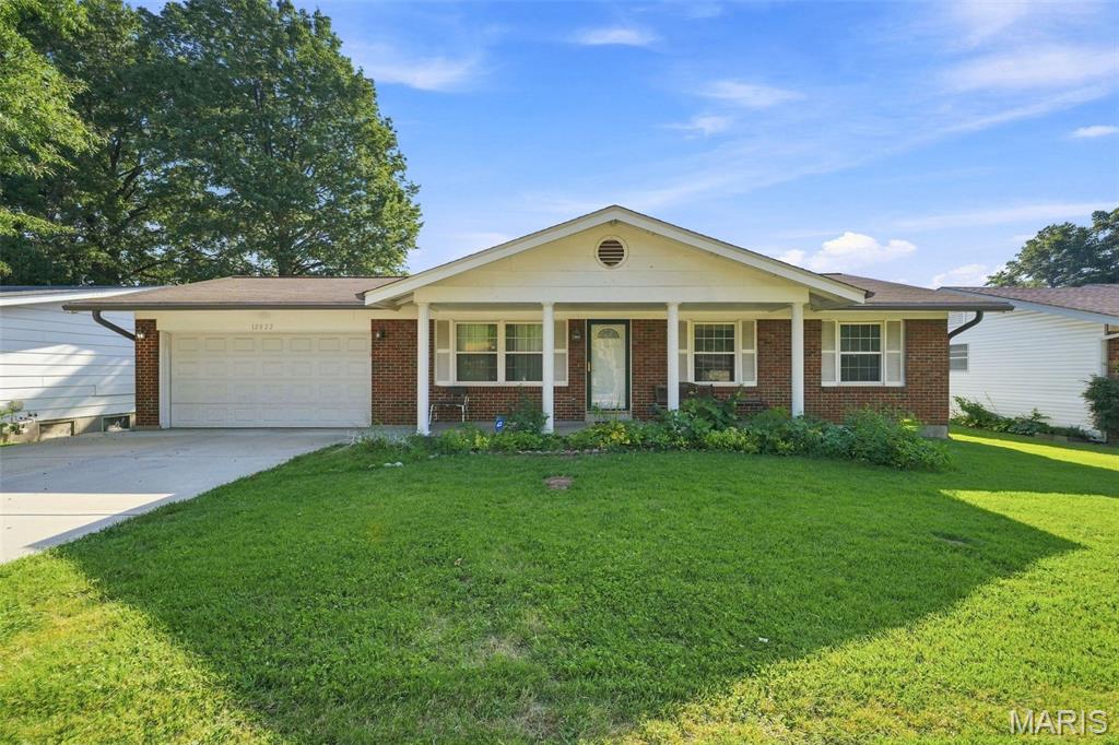 Photo of 12022 Trampe Heights Lane, Hazelwood, MO 63138 (MLS # 26056661)