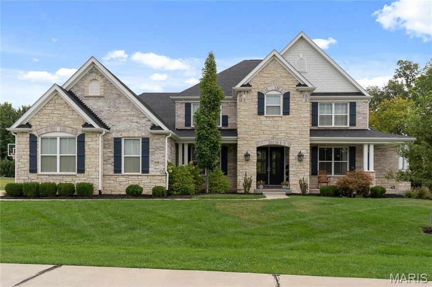 Welcome to this stunning 5 bedroom, 5 bath luxury residence located in the prestigious Bluffs at Windcastle community of St. Charles. Built in 2019, this exquisite home combines timeless traditional design with sophisticated, high-end finishes, offering over 4,600 square feet of beautifully appointed living space on a private .84-acre lot. Every element has been thoughtfully selected to create a home that’s as functional as it is beautiful, with refined craftsmanship and exceptional attention to detail throughout. Step inside the grand foyer and be greeted by soaring ceilings, an open layout, and elegant finishes that instantly convey warmth and luxury. The main level showcases Visual Comfort lighting throughout, setting the perfect tone in every room, along with Emtek cabinet and door hardware that elevates the home’s design with understated elegance. The spacious great room, anchored by expansive windows, fills the space with natural light and frames peaceful views of the lush backyard. The gourmet kitchen is a true showpiece, featuring custom cabinetry, a large center island with seating, premium stainless steel appliances, and a walk-in pantry. Designed for both beauty and practicality, the kitchen opens seamlessly to the dining area and living spaces, creating the perfect environment for hosting gatherings or enjoying everyday life. The main floor also includes a luxurious primary suite, offering a serene retreat with spa-like finishes. The ensuite bath boasts Kohler plumbing fixtures, faucets, toilets, and soaking tub, blending functionality and elegance with timeless style. Dual vanities, a walk-in shower, and a large custom closet complete the space. Upstairs, you’ll find additional generously sized bedrooms and bathrooms, all designed with the same high-quality finishes and attention to detail. A spacious loft area provides a flexible space perfect for a secondary living area, playroom, or home office. Each room offers versatility for family, guests, or work-from-home needs. The unfinished lower level offers over 2,700 square feet of additional living and entertainment space, ideal for a recreation area, media room, fitness space, or optional sixth bedroom. Outside, the beautifully landscaped level yard features a full irrigation system, ensuring year-round curb appeal. The exterior is finished with Hardie siding, known for its durability, low maintenance, and upscale appearance. With an attached three-car garage, there’s ample room for parking, storage, and hobbies. Located in the Francis Howell School District, this exceptional home is part of one of St. Charles’ most desirable neighborhoods, offering a peaceful setting with easy access to top-rated schools, shopping, dining, and major highways. The Bluffs at Windcastle is renowned for its elegant homes, scenic surroundings, and strong sense of community. Blending modern comfort with timeless craftsmanship, this home truly defines luxury living in St. Charles!