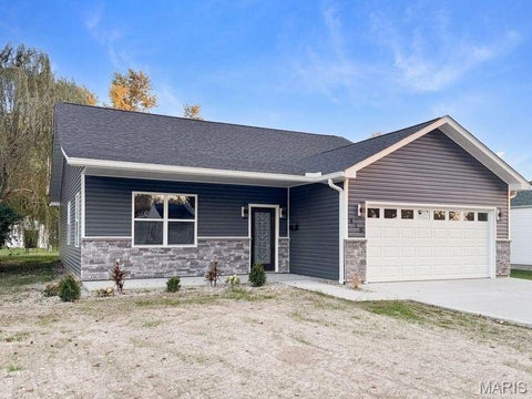 Photo of 410 W Saint John ST, Vandalia, MO 63382 (MLS # 26069356)