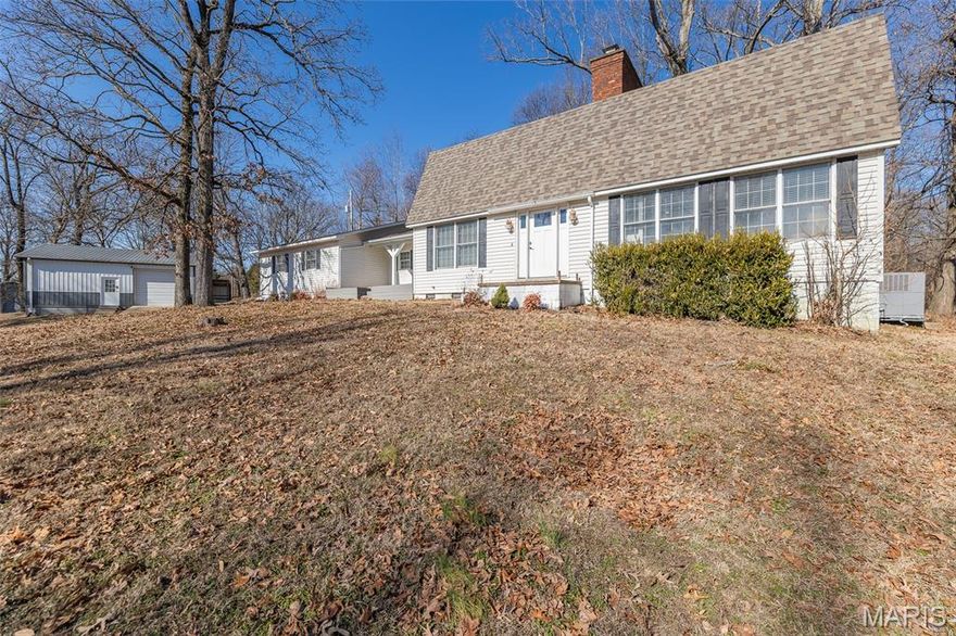 Nestled just outside of Dexter, Missouri, this charming 2,528-square-foot home offers the perfect blend of privacy, space, and functionality on 1.2 scenic acres. Tucked away in a peaceful setting, the property provides a quiet retreat while still being just minutes from town. Inside, you’ll find a thoughtfully designed two-level layout featuring four spacious bedrooms and three and a half baths, offering plenty of room for family and guests. The open kitchen flows seamlessly into the main living area, creating an inviting space for everyday living and entertaining, while a formal dining room adds an elegant touch for holiday gatherings and special occasions. Two cozy fireplaces provide warmth and charm, making the home feel welcoming year-round. Step outside and enjoy the expansive yard with room to roam, garden, or simply relax in the serene surroundings. A standout feature of the property is the detached shop, already plumbed for a bathroom, offering endless possibilities for a workshop, hobby space, home business, or future guest quarters. This private country property combines comfort, versatility, and location—making it a rare find just outside Dexter.