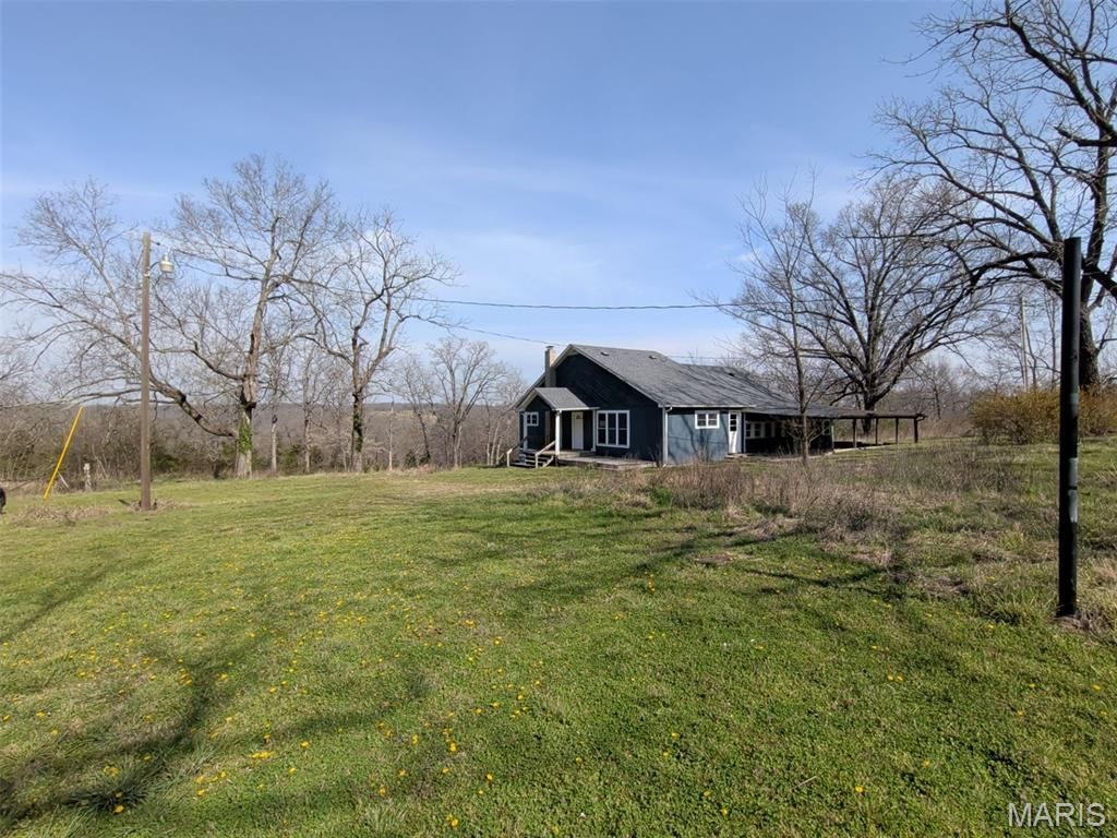 Photo of 5000 Highway 5, Hartville, MO 65667 (MLS # 26019462)