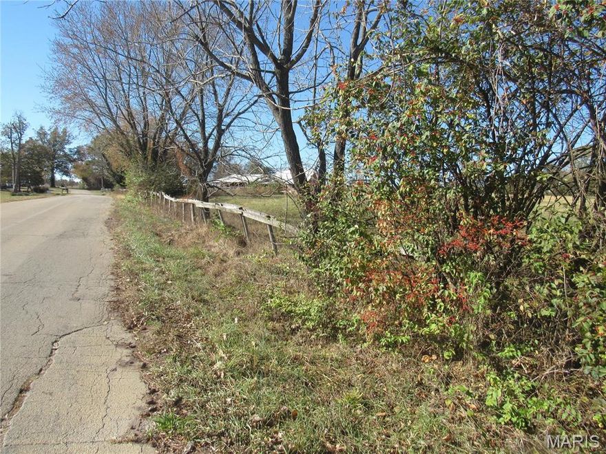 16+ ACRES of Prime Property Located Just off Hwy 67. LOTS of Road Frontage- Approx 1800 Ft on Liberty & 1000 on Bray Rd. Farmhouse & Barn located there now, but bring Your Ideas for this Great Property! Great Commercial Potential!