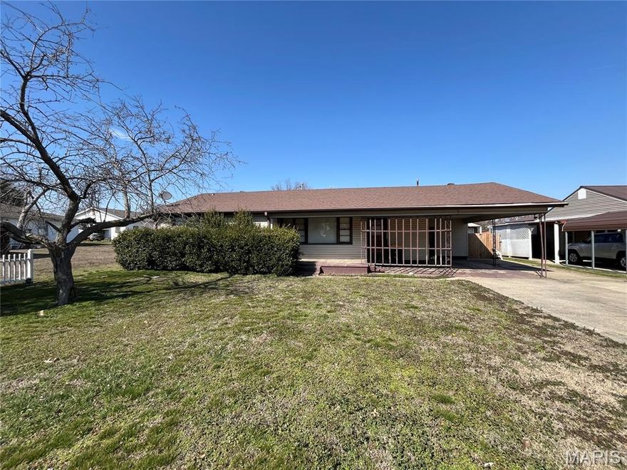 2 Bedroom, 2 bathrooms, with lots of natural lighting! Approximately 1,593 Sq Ft of room. This home offers a 1 car carport that leads to 3 entryways. A Bonus room connected to the covered patio in the fenced in backyard. A Kitchen at the central point of the home leads to the sun room, bedrooms, bathrooms, and circles back to the main living area which also has lots of natural lighting and a beautiful hardwood floor. Lot Size 70X128.08 Shown by appointment only.