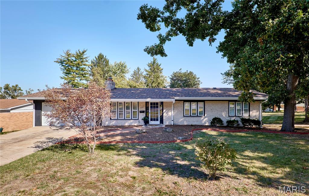 Photo of 7707 Springdale Drive, Normandy, MO 63121 (MLS # 26066446)
