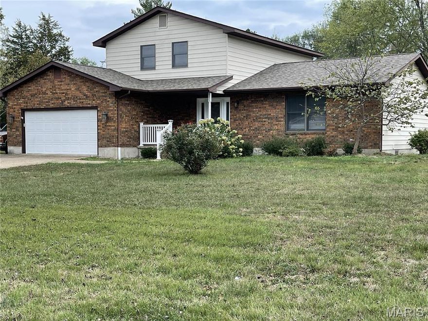 This newly remodeled 4 bedroom, 3 full bath, home is a must see.  Surrounded by 1 acre of level yard gives you the privacy that you want and yet in walking distance of stores and activities.  Make an appointment today before it's gone.