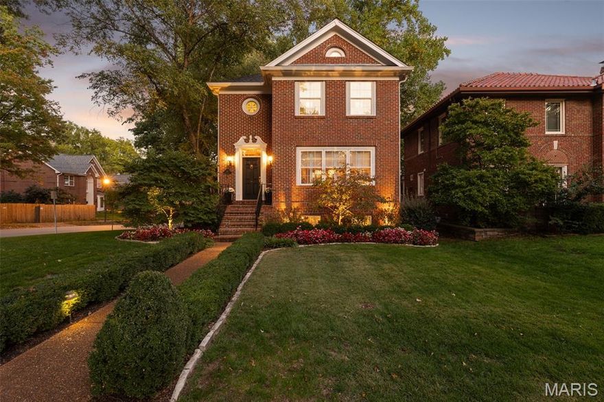 Timeless charm meets modern comfort in this 27-year-young home nestled among century-old residences just blocks from downtown Clayton. Blending traditional architecture with refined updates, it features hardwood floors throughout and a newer kitchen with Marble counters, stainless appliances, and an inviting eat-in area opening through French doors to a deck overlooking the manicured garden and water fountain. Adjacent, the family room offers a gas fireplace and built-ins—perfect for relaxed gatherings. The layout offers living and dining rooms and flows beautifully for entertaining. The primary suite includes a walk-in closet and updated bath, while two additional bedrooms share a Jack-and-Jill. A finished lower level adds flexible living or office space. Set on a pristine corner lot with an oversized two-car garage—rare for the area—this home blends classic character with contemporary comfort in one of University City's most desirable neighborhoods