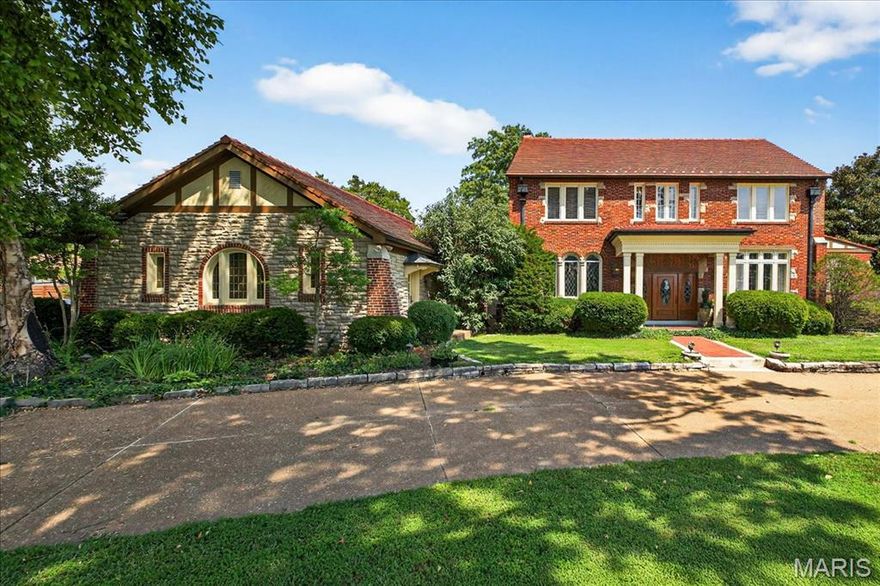 Stunning 1.5-story estate in Sunset Hills offering over 5,800 sqft of luxury living on a spacious 0.76-acre lot. Blending timeless charm with modern updates, this 5 bed, 5 bath home greets you with marble flooring, stained glass accents, and rich architectural detail. Formal dining, sitting, and game rooms feature classic millwork and leaded glass windows. The gourmet kitchen with Viking appliances flows seamlessly into a vaulted family room with a double-sided indoor/outdoor fireplace. Main-level primary suite features an expansive custom closet and spa-like bath. Upstairs includes a second primary suite and three additional bedrooms. The finished lower level offers a beautifully designed wine cellar. Outside, enjoy a private oasis with in-ground pool, imported Sicilian pizza oven, and dual pergolas—perfect for entertaining or relaxing. This home is truly a retreat in the heart of Sunset Hills.