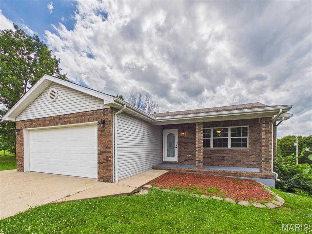 Photo of 24625 Spencer Road, Waynesville, MO 65583 (MLS # 26037511)