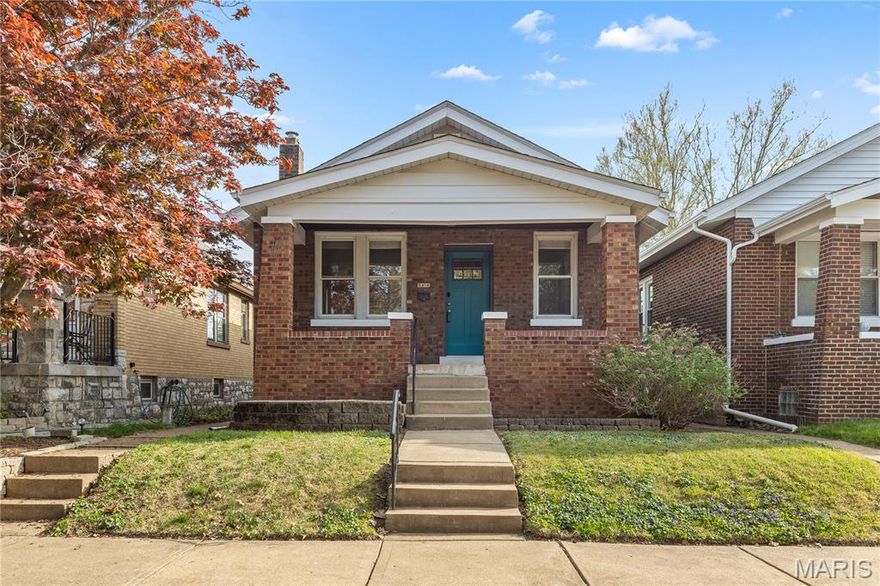 STORYBOOK craftsman bungalow in Lindenwood Park with incredible UPDATES, preserved historic charm, walkout lower level and privacy-fenced backyard. FULL BRICK exterior with enclosed soffit/fascia, newer architectural roof. COVERED FRONT PORCH and newer entry door welcome you inside. High ceilings and wonderful NATURAL LIGHT throughout. Living room decorative brick FIREPLACE and archway to dining room. HARDWOOD flooring spans most of main level. Elegant dining room with breakfast bar (honey locust wood top), open to renovated kitchen. DOVE GRAY 42" shaker cabinets with crown, STAINLESS appliances with upgraded GAS GRIDDLE stove, dishwasher and microwave hood. Herringbone MARBLE backsplash, GRANITE counters, storage pantry and durable wood-look ceramic tile flooring. Updated kitchen plumbing stack. Newer back door with access to newer CEDAR DECK with iron spindles overlooking backyard. Bedrooms share hall bath with tiled tub/shower combo. WALKOUT LOWER LEVEL with laundry area and tons of storage. PRIVACY-FENCED yard with plenty of space to garden/entertain and play - or utilize a portion to add parking pad or garage. WALKABLE to restaurants on Watson Rd, and enjoy SCENIC PARKS nearby: 29-acre Tilles Park (sports, playground, splash pad, fitness and trails) and 14-acre Lindenwood Park (sports, playground, trail). ULTRA CONVENIENT location near Highways 44/366 with most errands within a half mile!